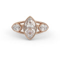 Front view of a 3 carat marquise cut lab grown diamond bezel engagement ring with side accents in 14k rose gold.
