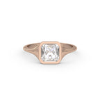 Front view of a 2 carat Asscher cut lab grown diamond solitaire ring in a 14k rose gold bezel setting.