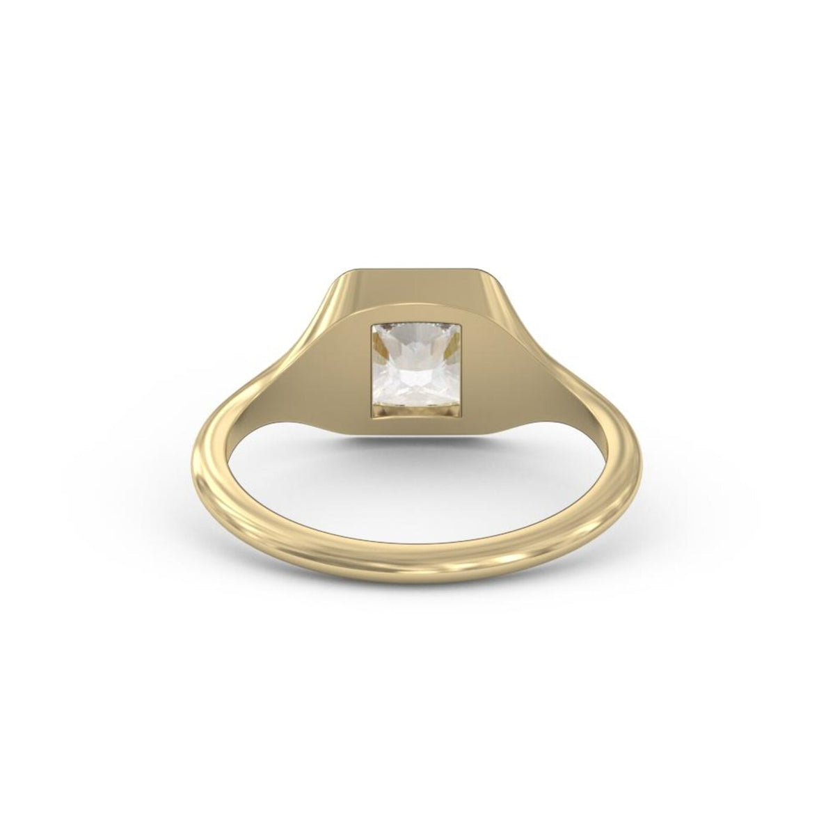 A yellow gold signet ring with a square bezel setting holding a clear, cushion-cut gemstone, shown on a plain white background.