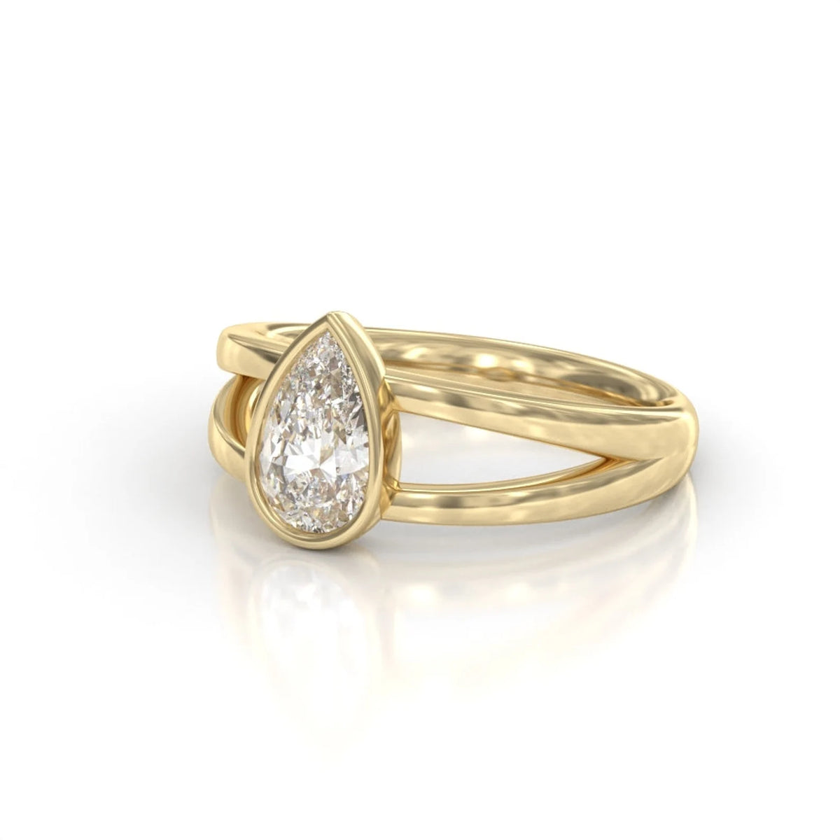 Side perspective showing split shank double band detail of 2 carat pear cut bezel set diamond ring.