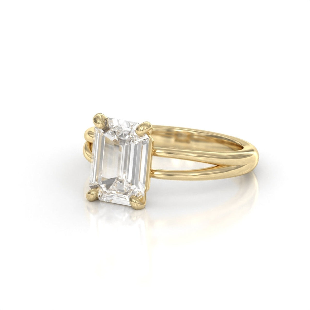Perspective view of a 3 carat emerald cut lab grown diamond solitaire ring in yellow gold with a split shank band.
