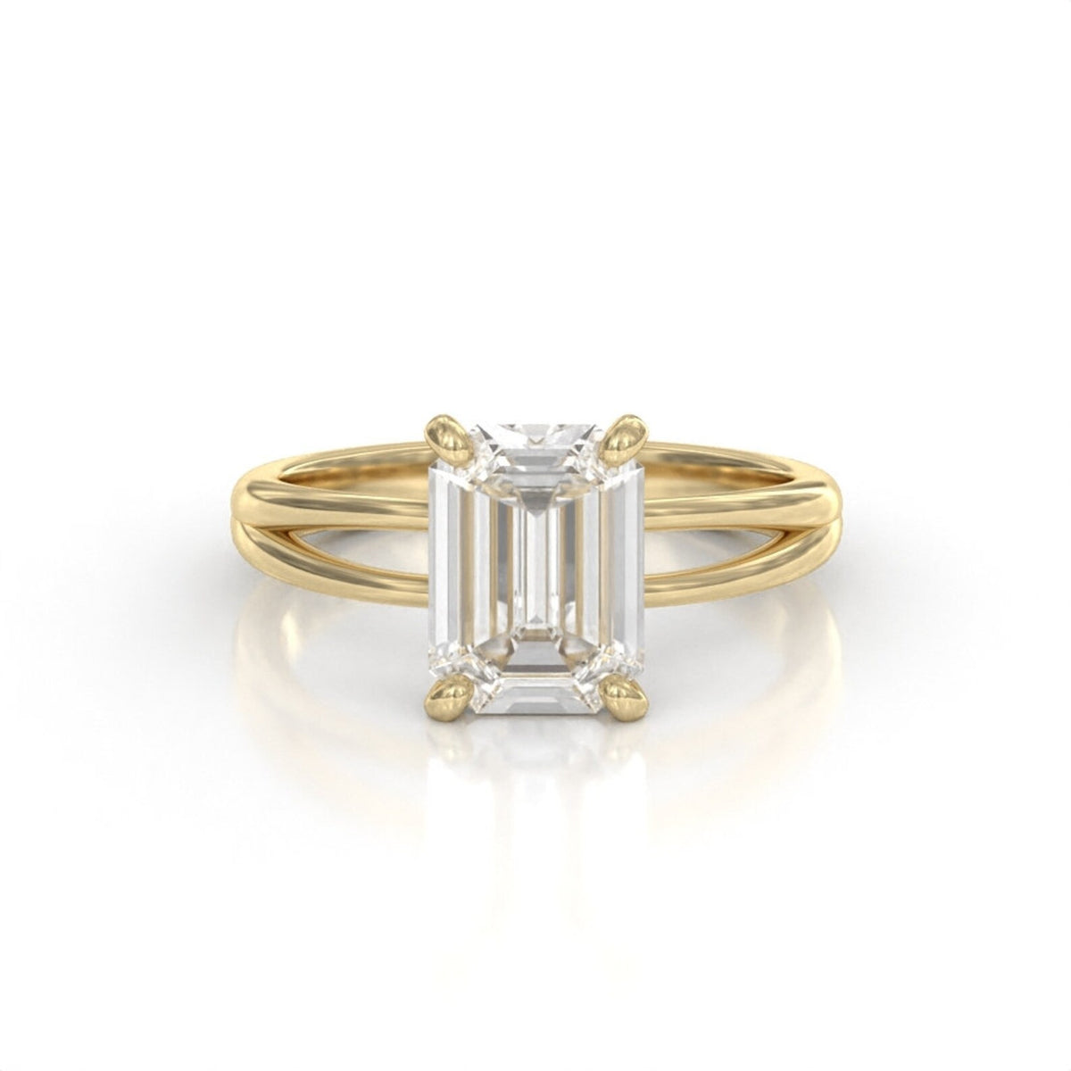 Front view of a 3 CT emerald cut lab grown diamond engagement ring in yellow gold with 4 prongs.