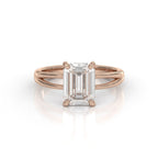 Front view of a 3 CT emerald cut lab grown diamond engagement ring set in rose gold with a split shank band.