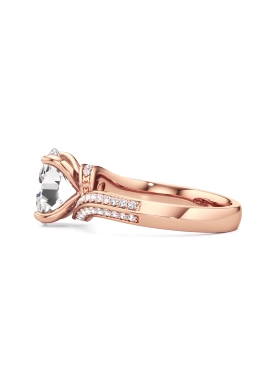 Side perspective of a rose gold bypass engagement ring featuring two rows of pave-set accent diamonds.