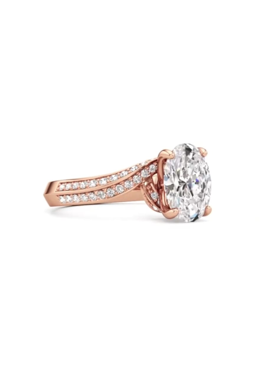 Angled front perspective showcasing the brilliant 2ct oval cut lab diamond and pave swirl band.