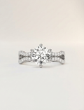 2 carat round brilliant cut lab diamond twist engagement ring.