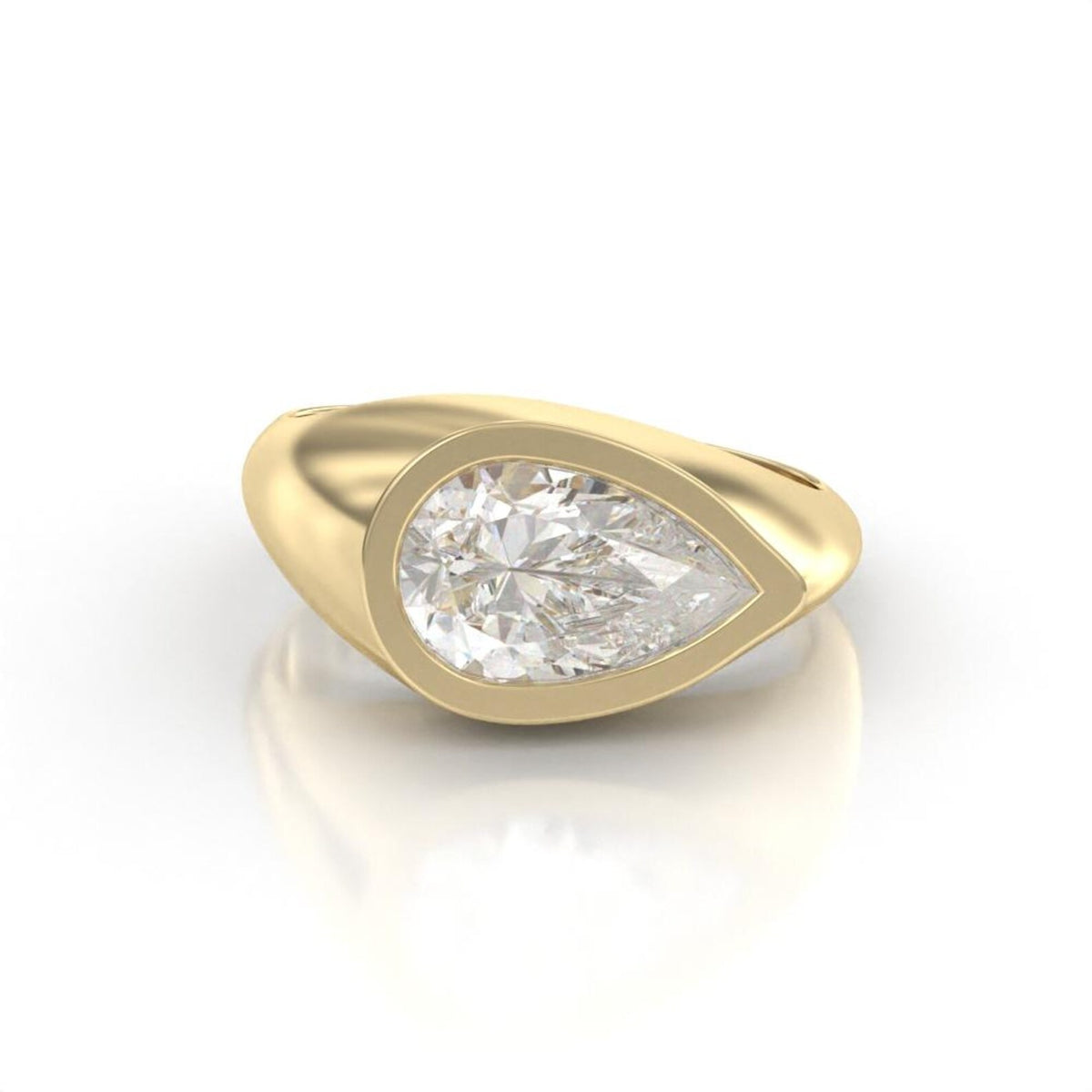 Side angle of a bold 3 carat pear cut lab diamond signet ring showcasing the wide yellow gold band.