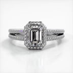 Front view of 2 CT emerald cut lab grown diamond ring in white gold featuring a micro-pave halo and split shank band.