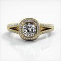 Front view of 2 CT cushion cut lab grown diamond ring with micro-pave halo and split shank band in yellow gold.