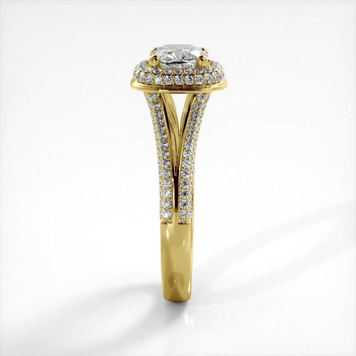 Side profile view of yellow gold 2 CT cushion cut lab diamond engagement ring highlighting micro-pave band structure.