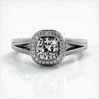 Front view of 2 CT cushion cut lab grown diamond ring with micro-pave halo and split shank band in white gold.