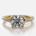 Front view of 2 CT round lab grown diamond engagement ring with pave cathedral band in yellow gold.
