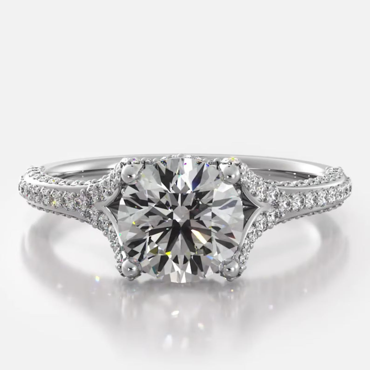 Front view of 2 CT round cut lab grown diamond engagement ring in white gold featuring micro-pave accents.