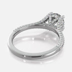 Angled perspective view of white gold round cut lab diamond ring showing inner polished band and pave-set under-gallery.
