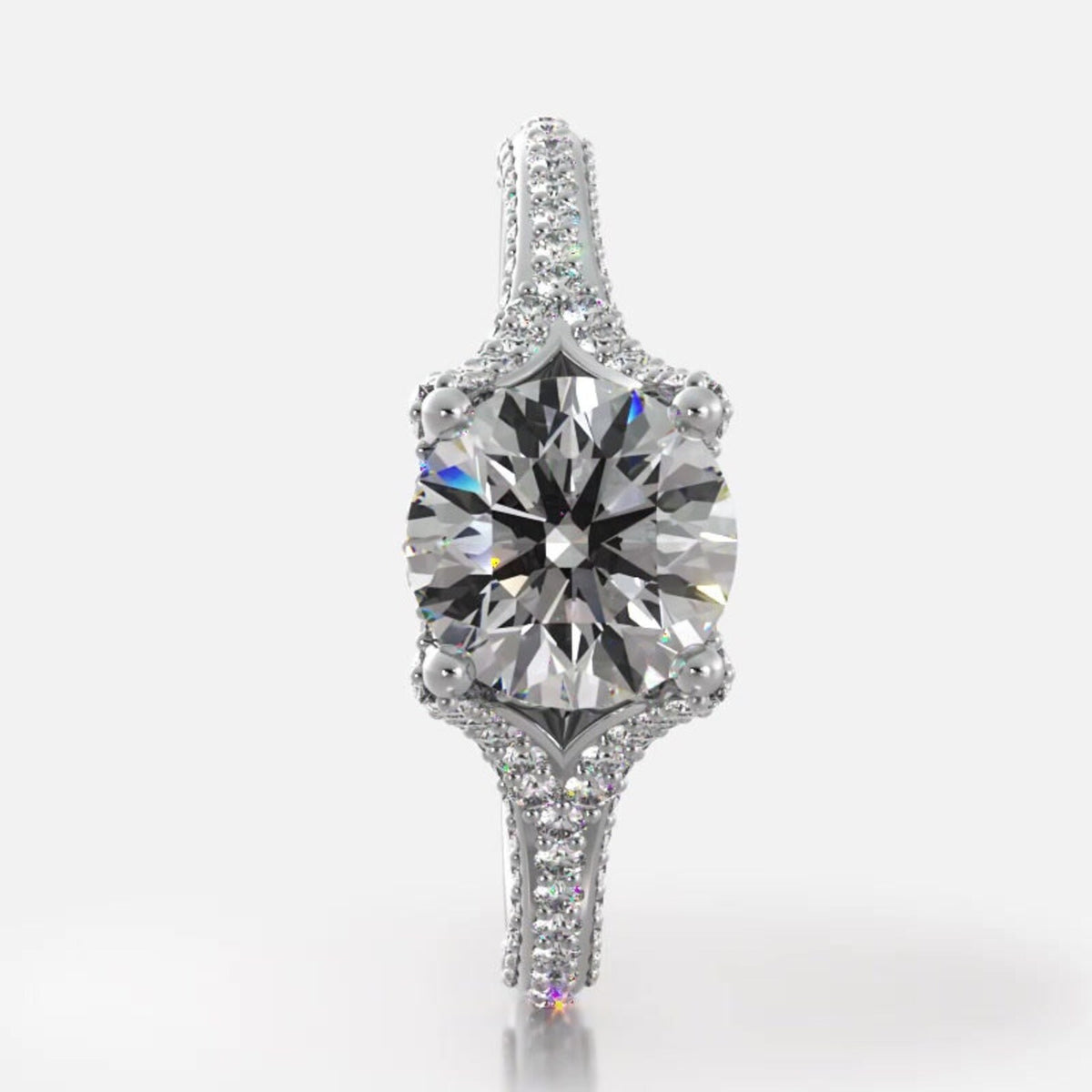 Overhead top-down view of 2 CT round brilliant lab diamond ring set in white gold with pave-accented shoulders.