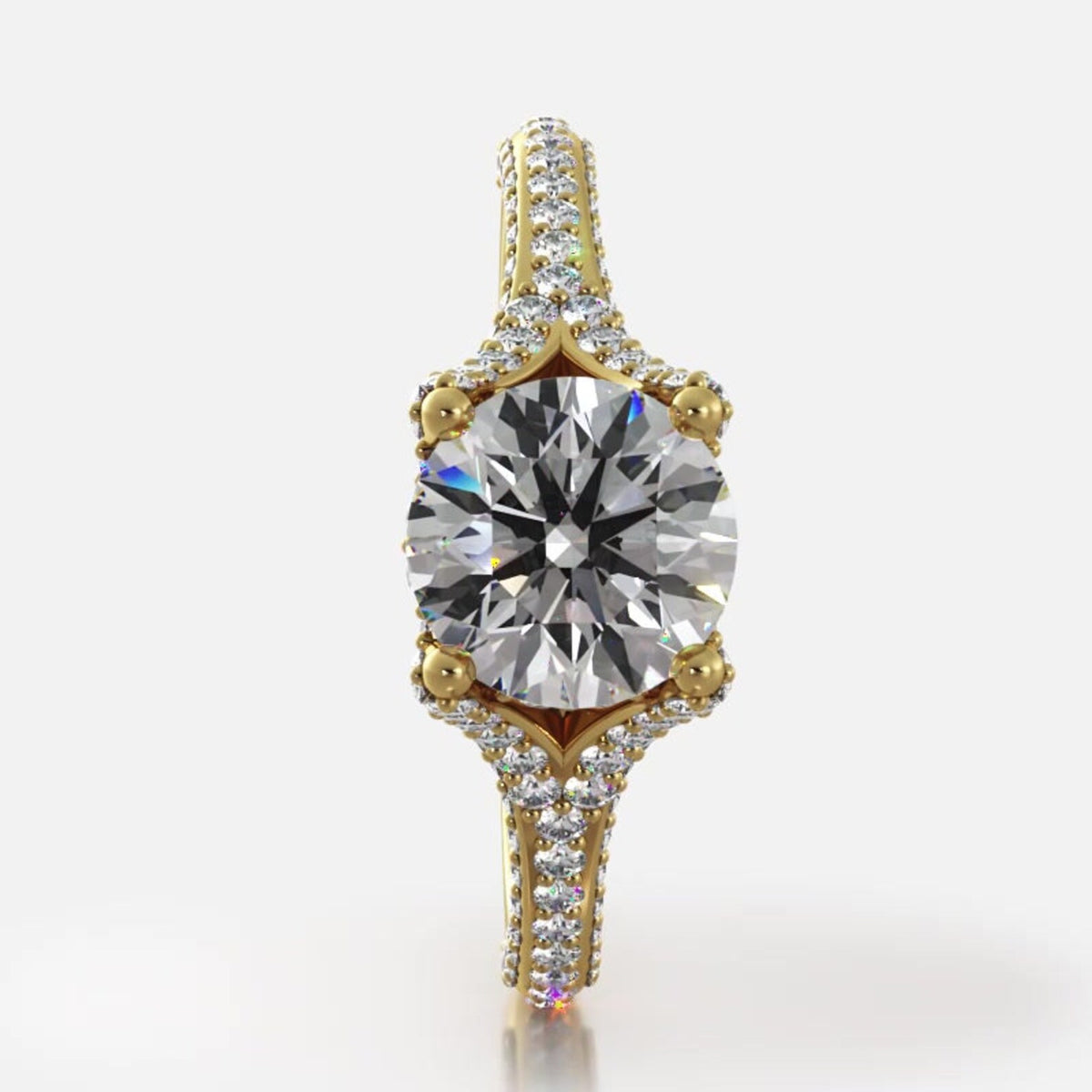 Overhead top-down view of 2 CT round brilliant lab grown diamond engagement ring set in 14K yellow gold.