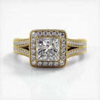 Direct front view of 2 CT princess cut lab diamond halo engagement ring with split shank in yellow gold.