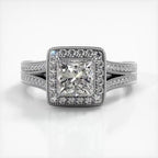 Direct front view of 2 CT princess cut lab diamond halo engagement ring with split shank in white gold.