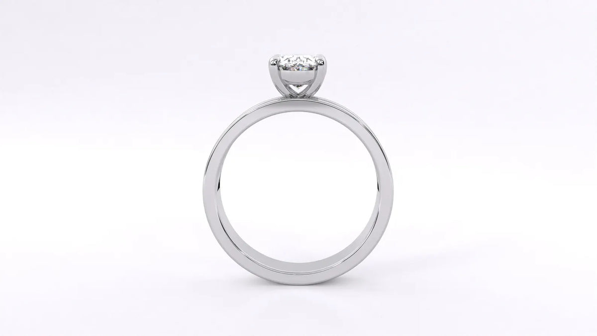 Direct side profile view of 2 CT oval lab grown diamond solitaire ring displaying head elevation and smooth shank profile.