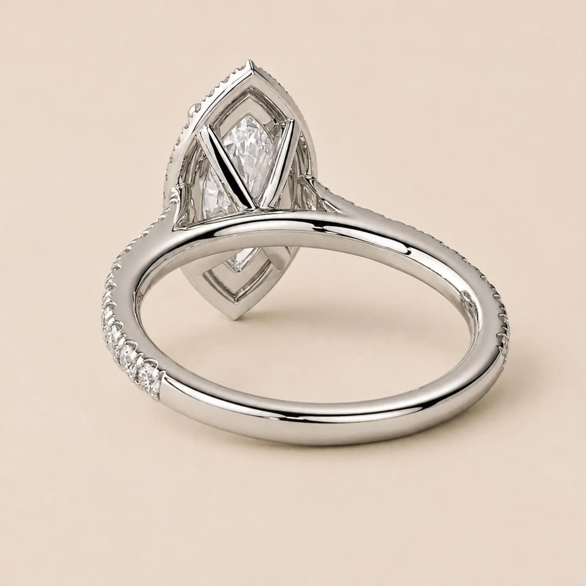 Underside setting detail of 3 Carat Marquise Cut Lab Grown Diamond Halo Ring showing basket craftsmanship