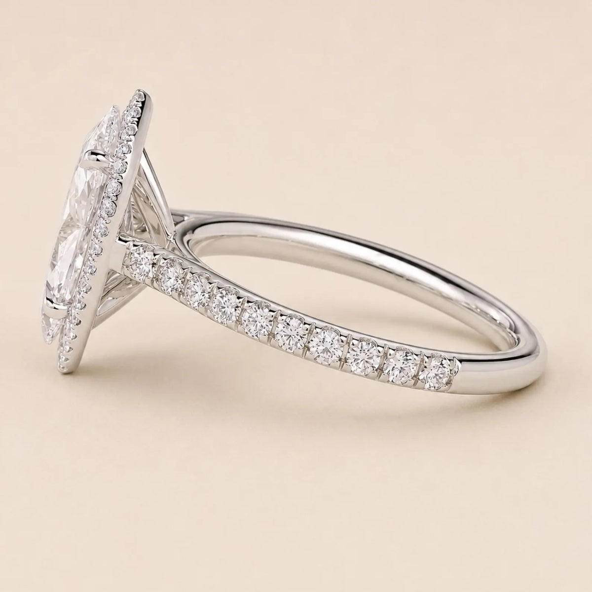 Angled side profile view of 3 Carat Marquise Cut Lab Grown Diamond Halo Ring highlighting pavé shank and head setting