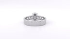 Bottom view of white gold oval lab diamond ring showing solid back shank transitioning to openwork filigree details