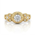 Front view of 2 CT round lab-grown diamond ring in yellow gold bezel setting