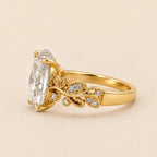 Alternate side view of 3 Carat Oval Cut Lab Grown Diamond Ring showing intricate leaf vine band with accent diamonds