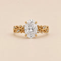 Top-down front view showing symmetrical botanical leaf band and 3 Carat Oval Cut Lab Grown Diamond center stone