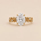 Top-down front view showing symmetrical botanical leaf band and 3 Carat Oval Cut Lab Grown Diamond center stone