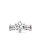 Front view of a 2 carat round brilliant lab grown diamond engagement ring with a 6-prong crown setting.