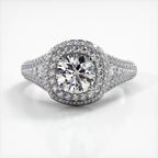 Top-down view of a white gold engagement ring featuring a 2 CT round lab diamond with double cushion halo.