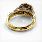 Bottom undergallery view of a yellow gold 2 carat round lab diamond ring showing inner pave bridge arches.