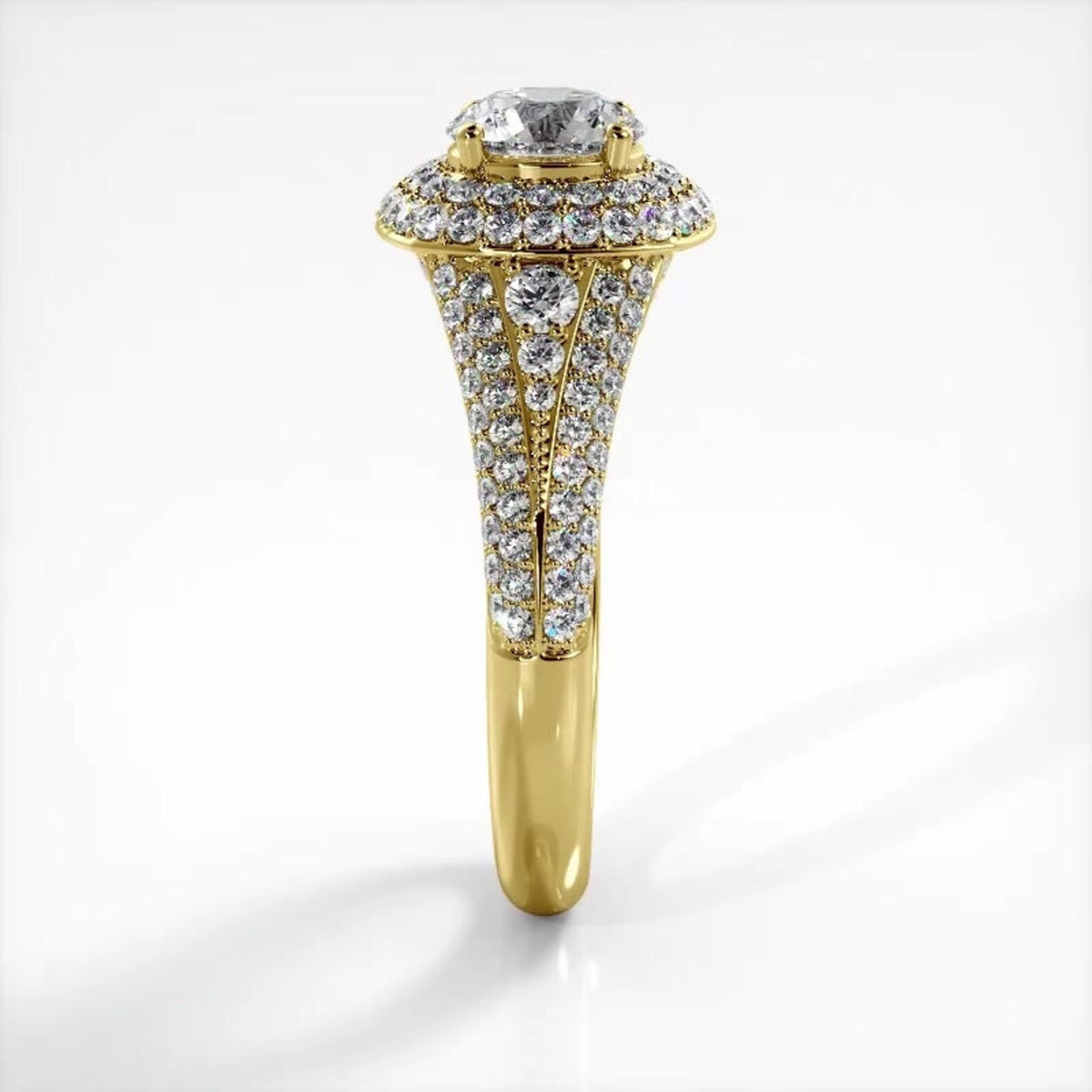 Side elevation view of a 14K yellow gold 2 CT round lab diamond engagement ring displaying pave band profile.