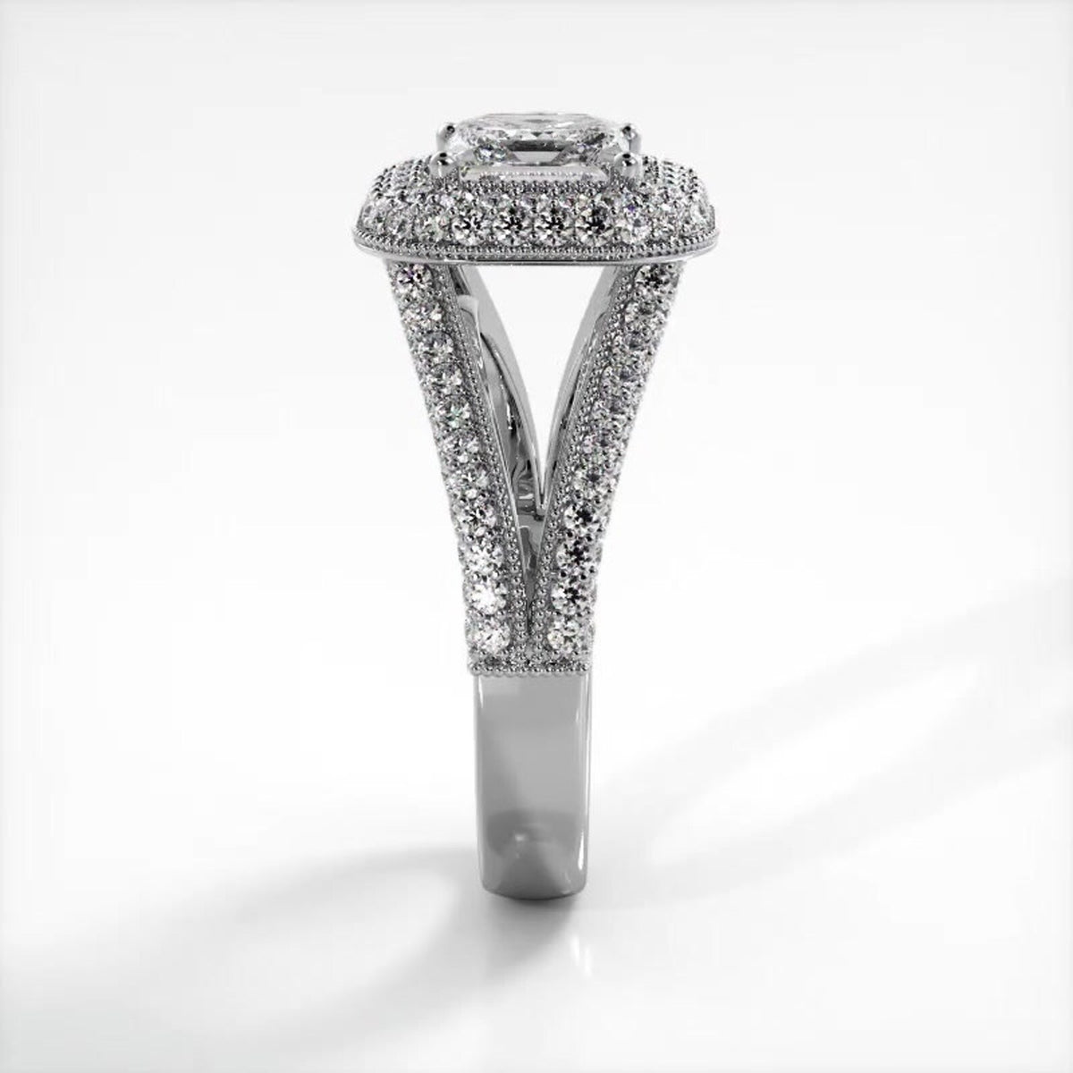 Side profile view of a white gold 2 CT princess cut lab diamond engagement ring showing pave split shank arches.