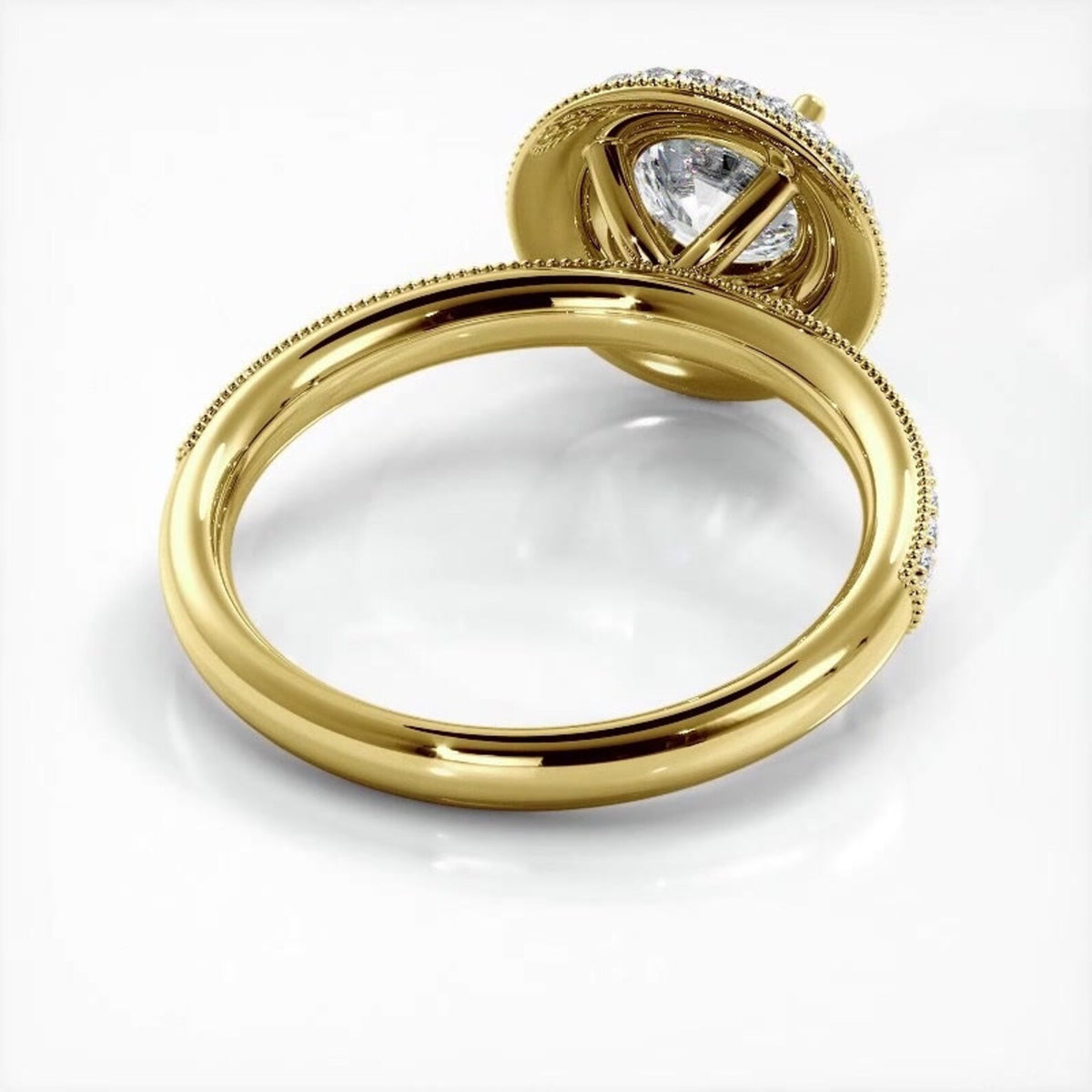 Angled undergallery perspective of a 2 carat round lab diamond ring in 14K yellow gold.
