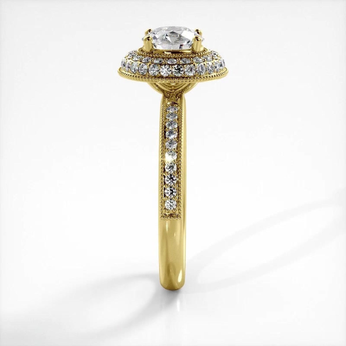Side profile view of a yellow gold 2 CT round lab created diamond engagement ring with pave shank.