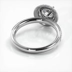 Angled interior undergallery view of a white gold 2 CT round lab diamond engagement ring.