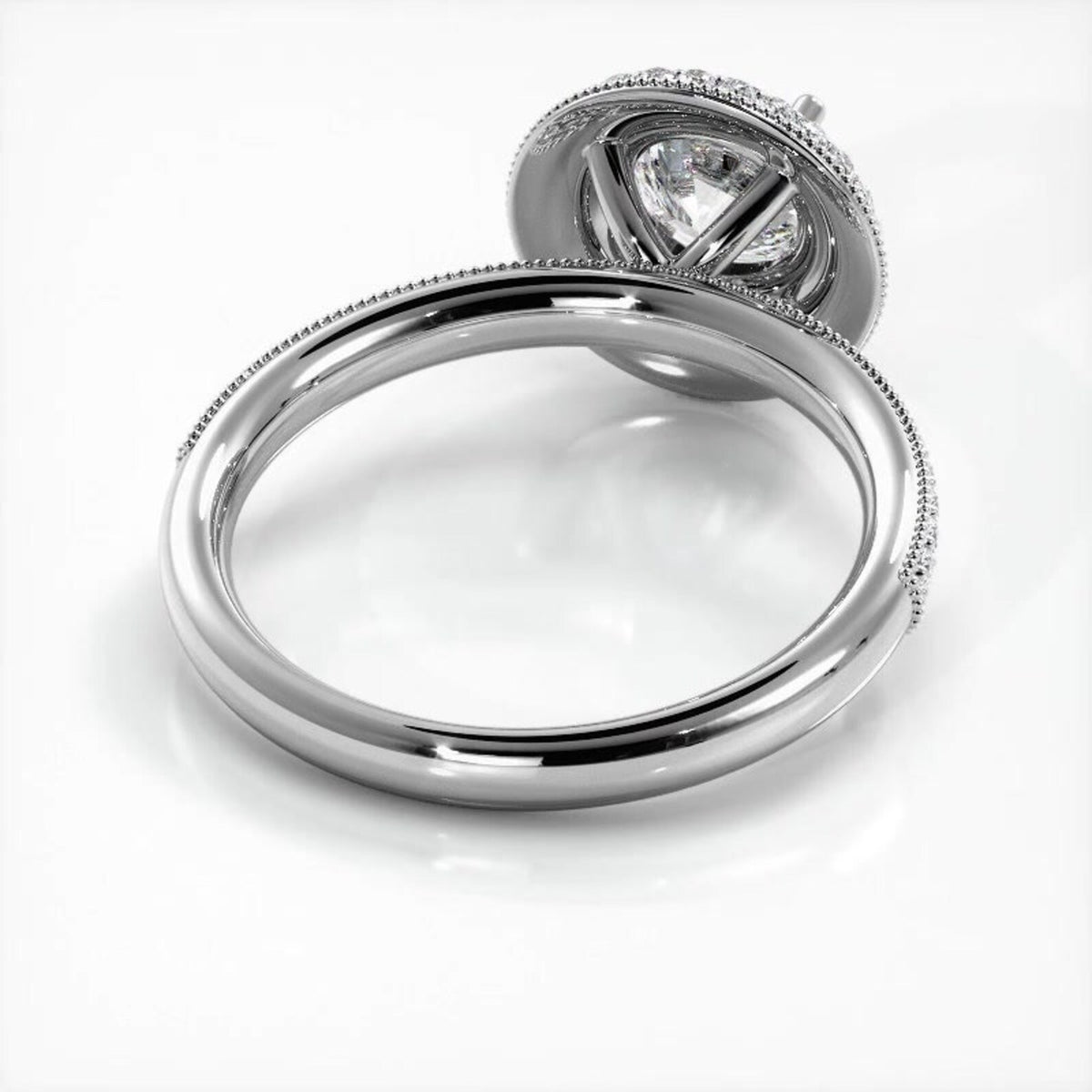 Angled interior undergallery view of a white gold 2 CT round lab diamond engagement ring.