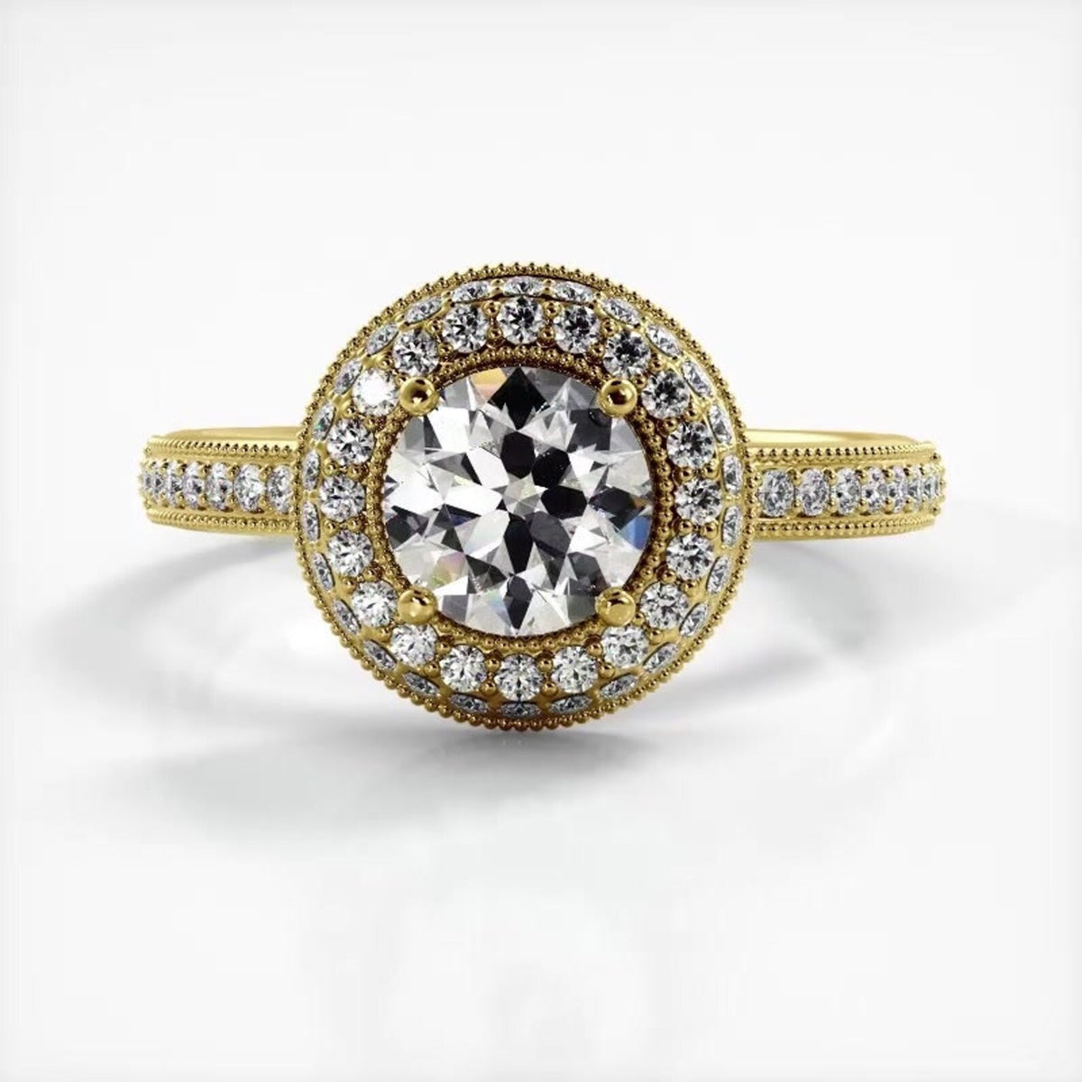 Top-down perspective of a yellow gold 2 CT round lab grown diamond ring with double round halo frame.
