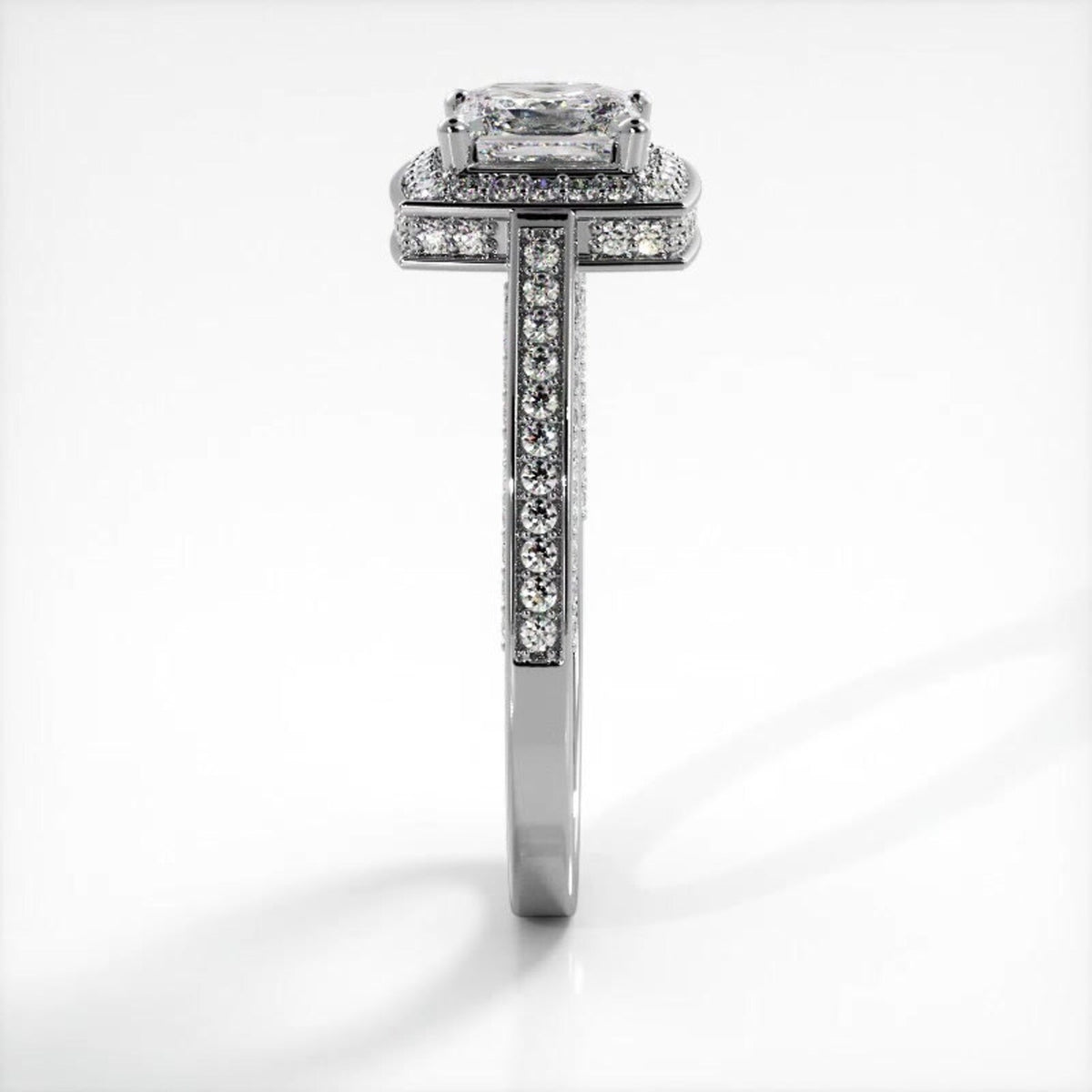 Side profile view of a white gold 2 CT princess cut lab diamond engagement ring with milgrain pave band.