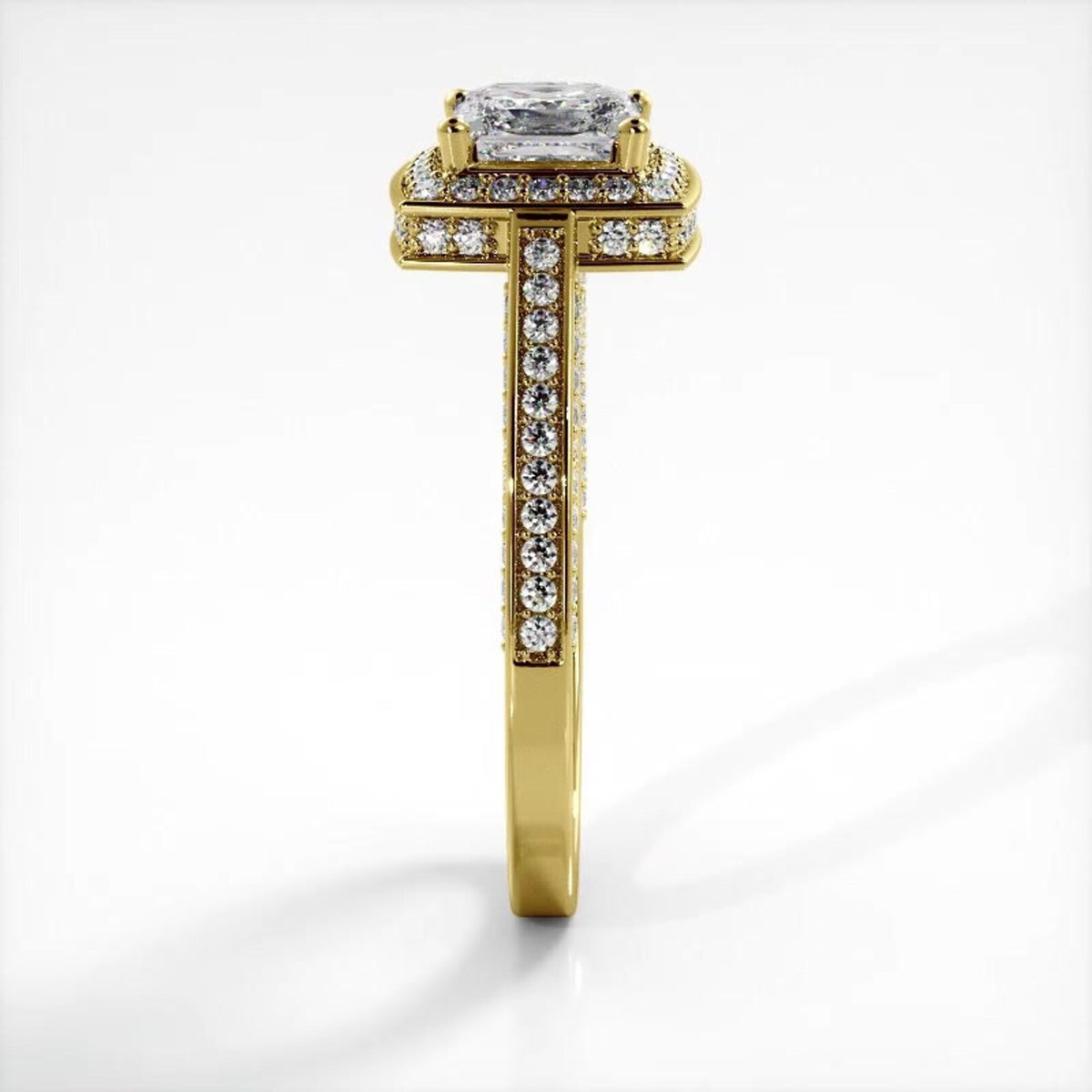 Side profile elevation of a 2 CT princess cut lab grown diamond halo ring in 14K yellow gold.