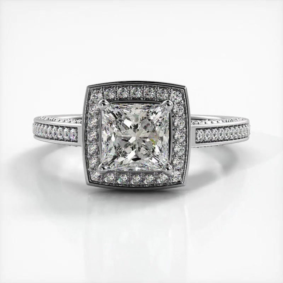 Top-down perspective of a 2 CT princess cut lab diamond engagement ring with cushion milgrain halo in white gold.
