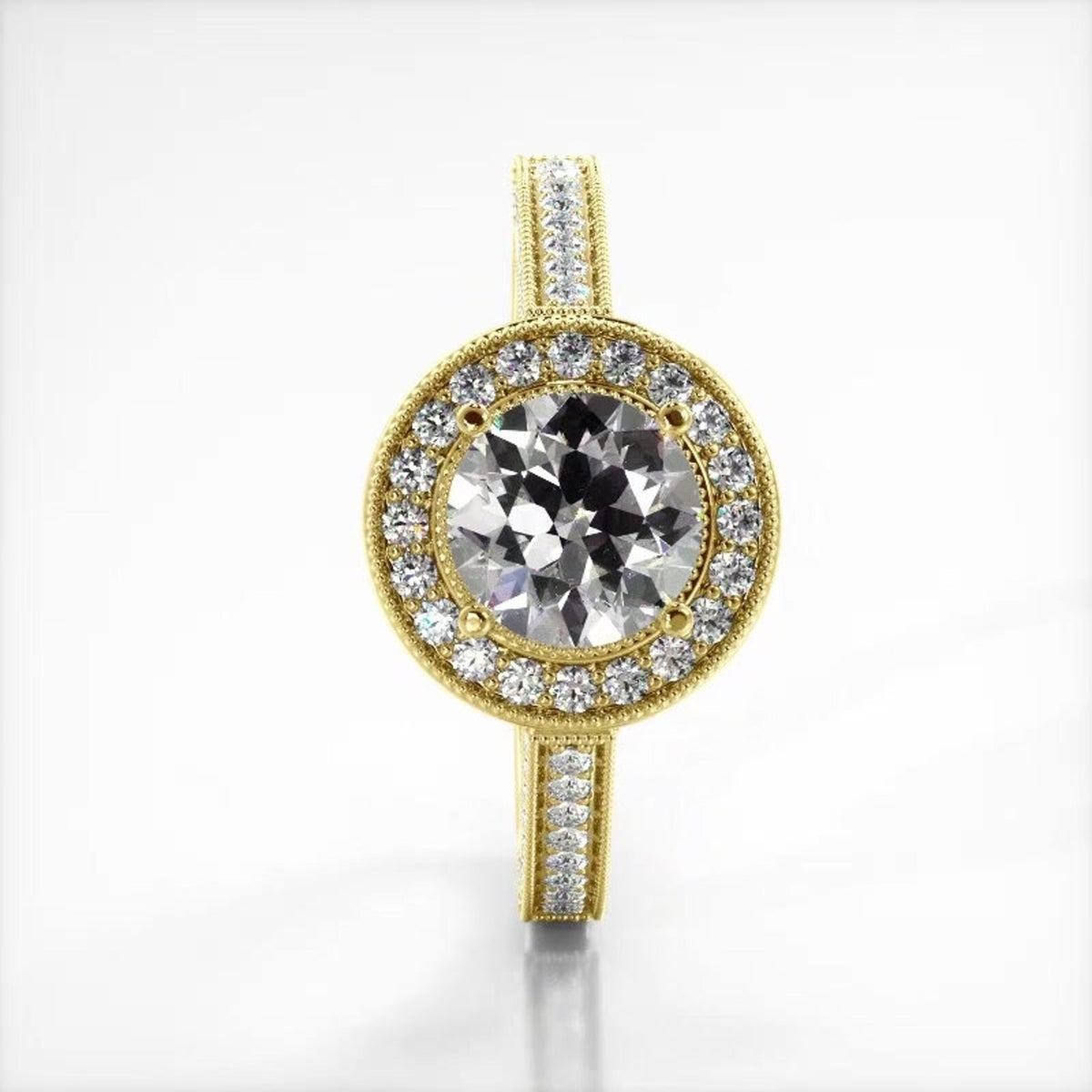 Vertical perspective top view of a 3 CT round lab diamond engagement ring in yellow gold.