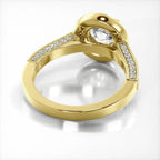 Angled undergallery view displaying the basket and inner shank of a yellow gold 3 CT round lab diamond ring.
