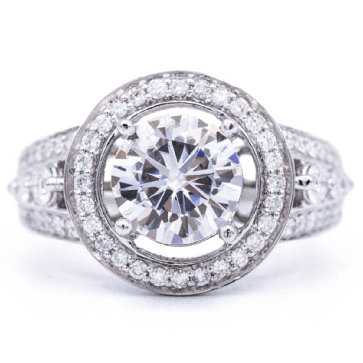 Top view of 3 CT round brilliant cut lab grown diamond ring with floating halo outer frame