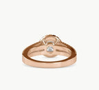 Under-gallery view showing the rose gold setting and split band structure of a round lab diamond ring.