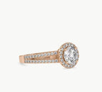 Top-angle view of a 2ct round lab diamond halo engagement ring with dual pave band in rose gold.