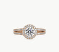 Direct top-down view of a 2 carat round cut lab grown diamond halo ring on a rose gold split-shank band.