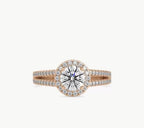 Direct top-down view of a 2 carat round cut lab grown diamond halo ring on a rose gold split-shank band.